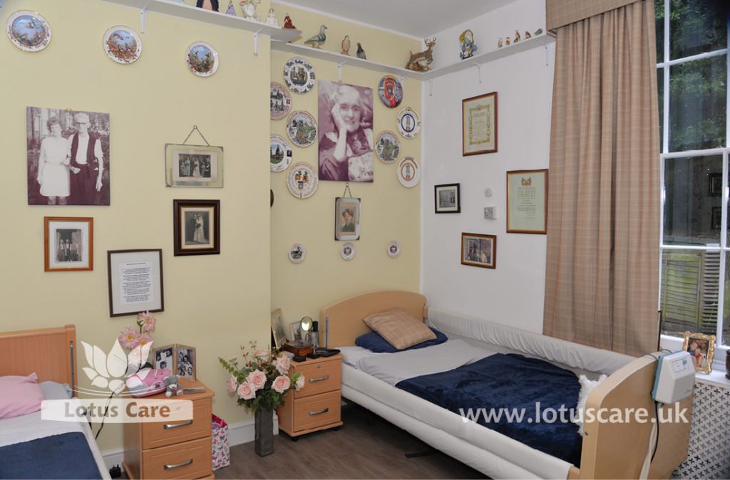 Lots of photos in a coupe’s room at The Villa Care Home, making it like their previous bedroom. 